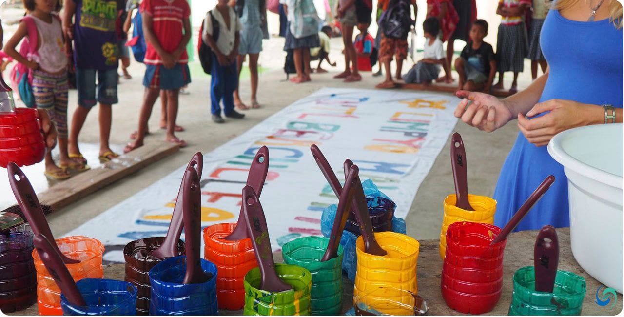 Beautiful colors, and fine times for the banner painting, with a community education message